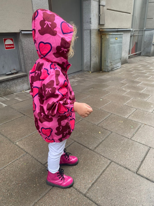 Flickors Rosa Vindjacka – Stilren Vårklädsel för Barn: Tunna Jackor, Regnrockar och Ytterkläder med Dragkedja för Flickor