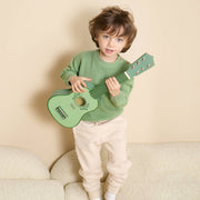 Grön leksaksgitarr Vintage i trä för barn