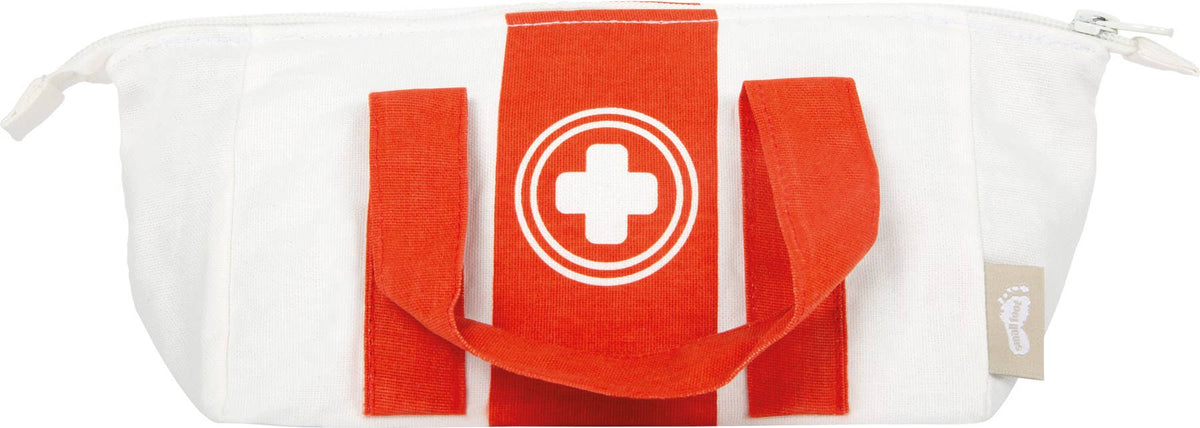 Röd doktorsväska för barn med träinstrument och patientkort