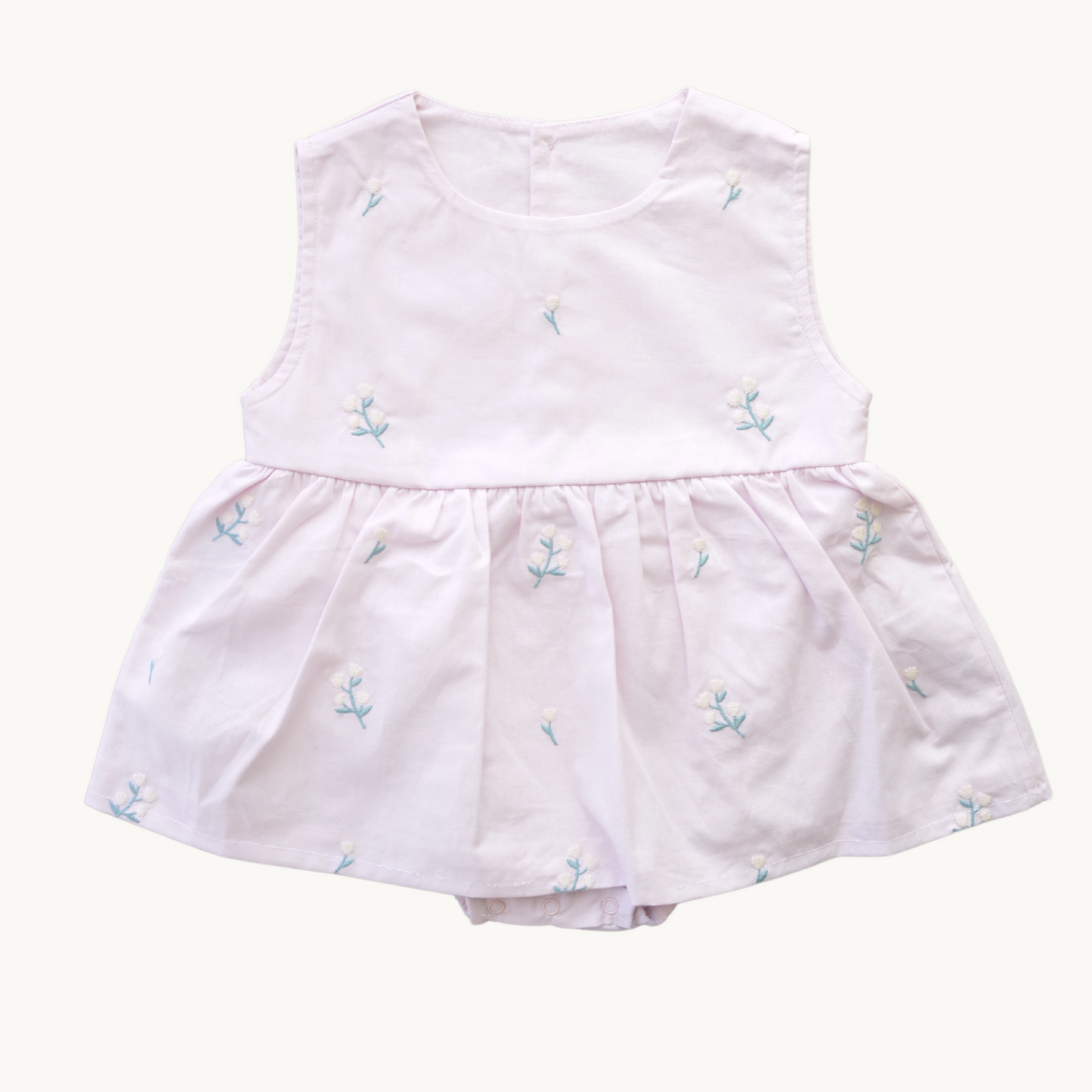 Heather romper baby i bomull – Broderade blommor