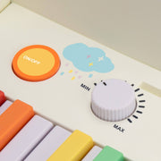 Vitt barnpiano Rainbow med lysande tangenter och ljud